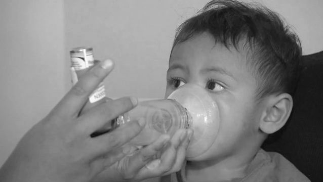 Child breaths from aspirator.