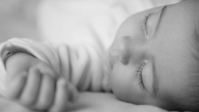 Close up image of baby sleeping.